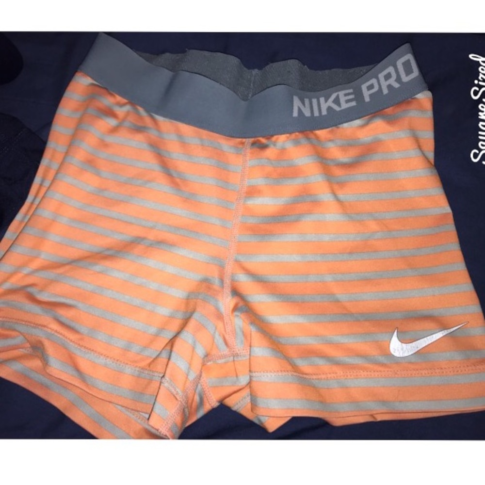 Orange Striped Nike Pros